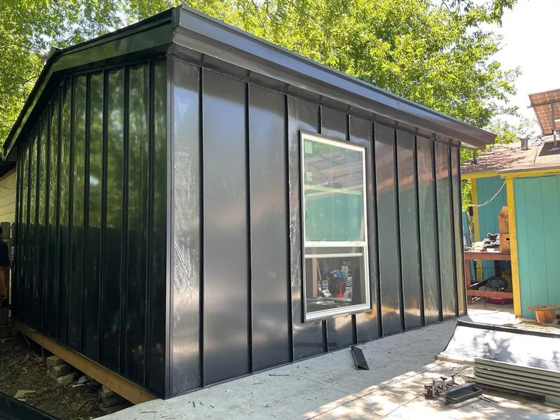 Black standing seam metal wall panels for Metal Roof Installation in Eustis